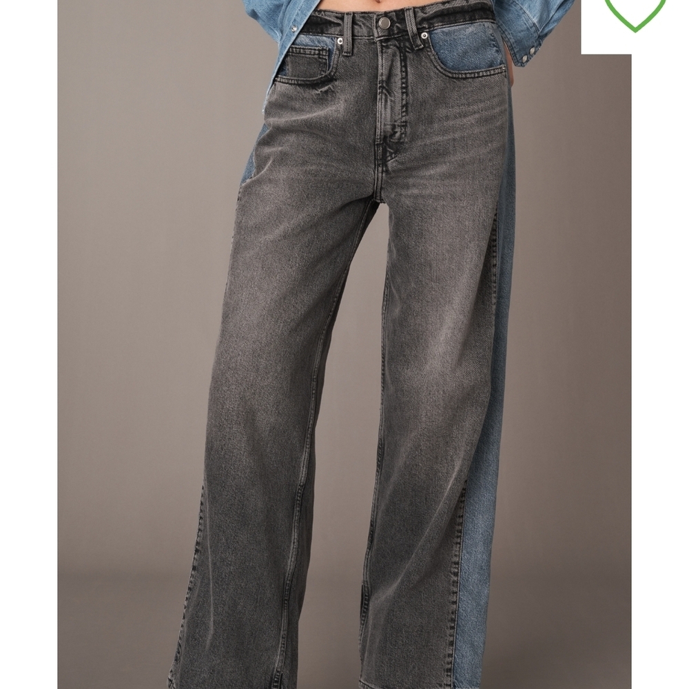 Good American Two-Tone Flare Jeans @ Sold @ Anthropologie